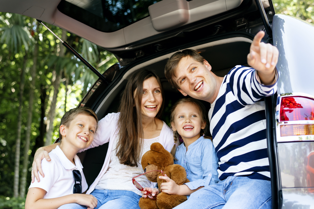 Happy family on a road trip